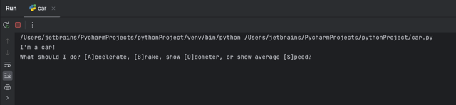 Official PyCharm tutorial crop: Run console executing the example car.py script.