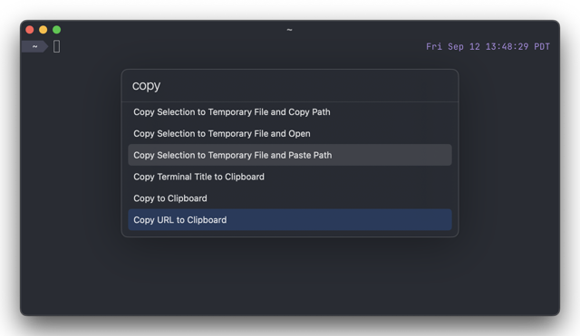Exemplo oficial do Ghostty 1.2 para macOS: pesquise ações de terminal na paleta de comandos.