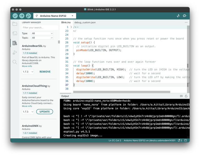 Official Mac Arduino IDE 2.2.1 example with sketch and Library Manager; historical UI, not 2.3.10.