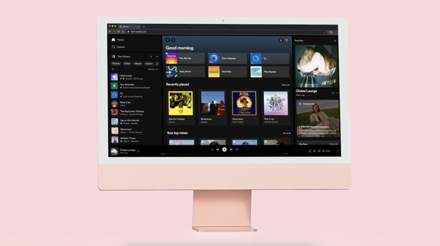 Official2023 desktop-layout illustration showing the Spotify web player on an iMac; not current Mac-client capture.