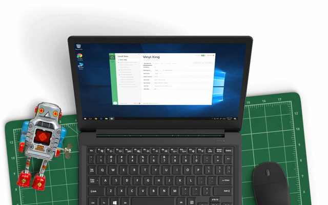 Historical laptop composition showing Local site setup on Windows; exact app version unknown.