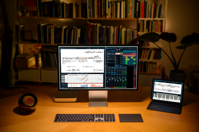 Official workstation photo showing Dorico score, piano roll and mixer views.